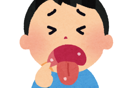 口内炎ができて痛そうにしている男の子のイラスト